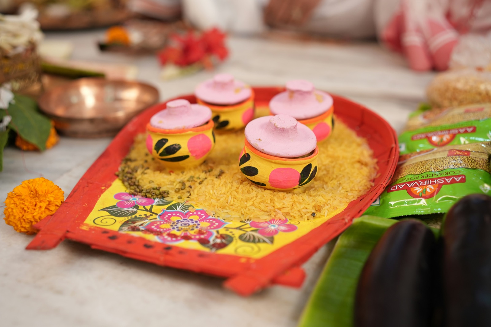 An ornate decorated tray of ceremonial gifts and offerings